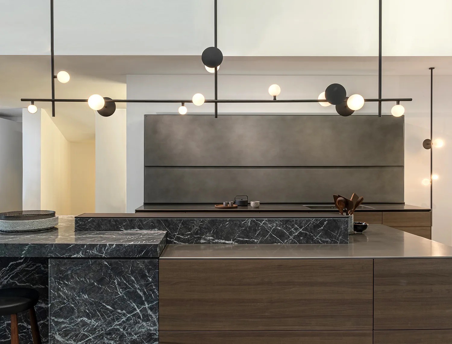 6464734f51fa167831450c7a Typography Vela Gantry Rakumba at Valcucine